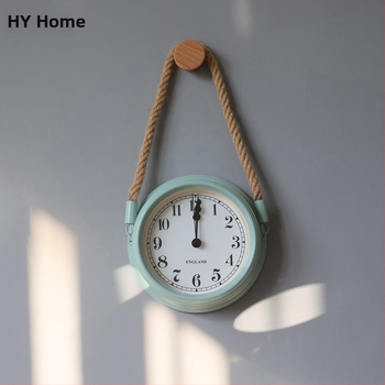 Ρολόι τοίχου σε σκανδιναβικό μινιμαλισμό, μεταλλικό περίβλημα και καντράν, κίνηση με μπαταρία quartz με sweep δεύτερο, στρογγυλός σχεδιασμός για καθιστικό