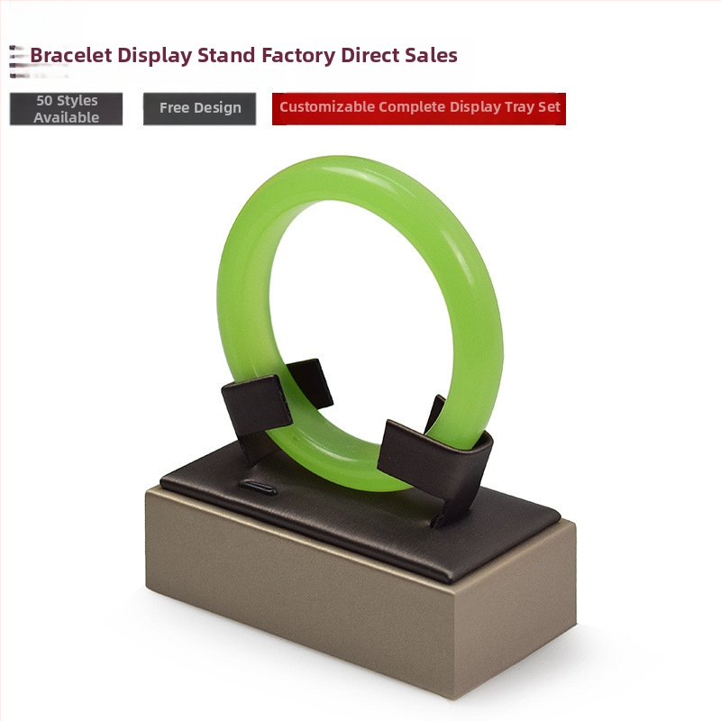 Juveelide kuvamisalust käevõrudele, kahekordne riiul, metallkonstruktsioon, nahkkattega korpus, süstimise vormimine