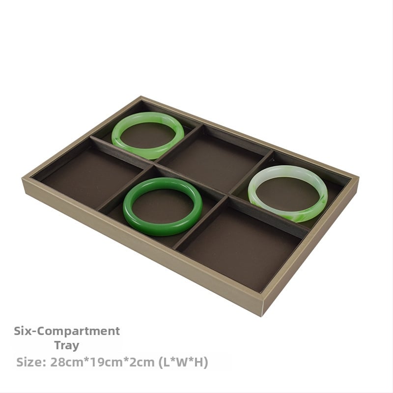 Juveelide kuvamisalust käevõrudele, kahekordne riiul, metallkonstruktsioon, nahkkattega korpus, süstimise vormimine