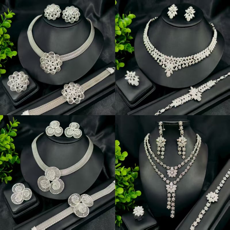 Vario juvelyrinių komplektas su deimantiniu pakabuku, gėlių raštu ir išplėsta grandine — įskaitant auskarus, karolį ir apyrankę