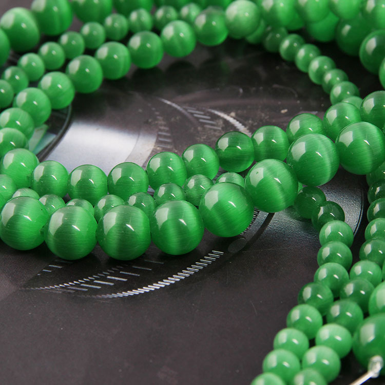 Laisvos karoliukai – katės akies akmens krištolo karoliukai, poliruoti, Korėjos stilius, kilnus raštas