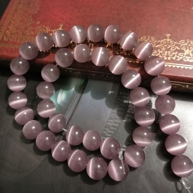 Laisvos karoliukai – katės akies akmens krištolo karoliukai, poliruoti, Korėjos stilius, kilnus raštas