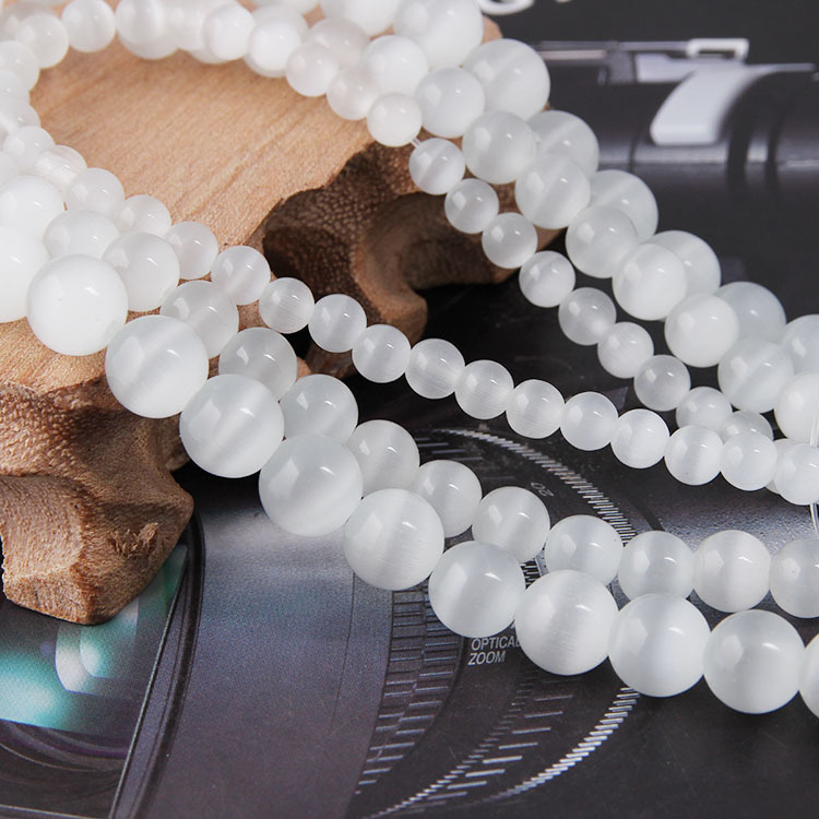 Laisvos karoliukai – katės akies akmens krištolo karoliukai, poliruoti, Korėjos stilius, kilnus raštas