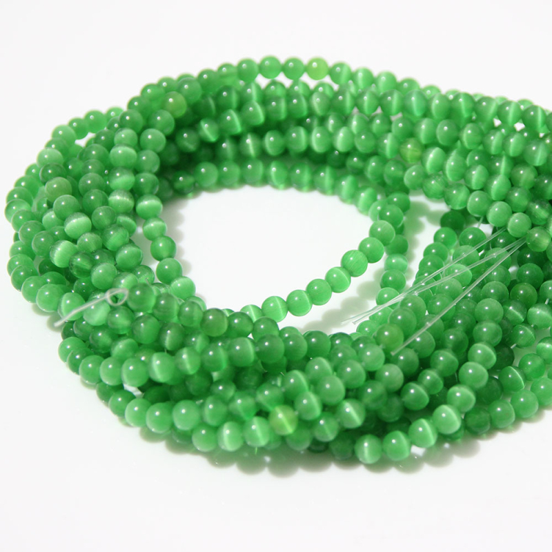 Laisvos karoliukai – katės akies akmens krištolo karoliukai, poliruoti, Korėjos stilius, kilnus raštas