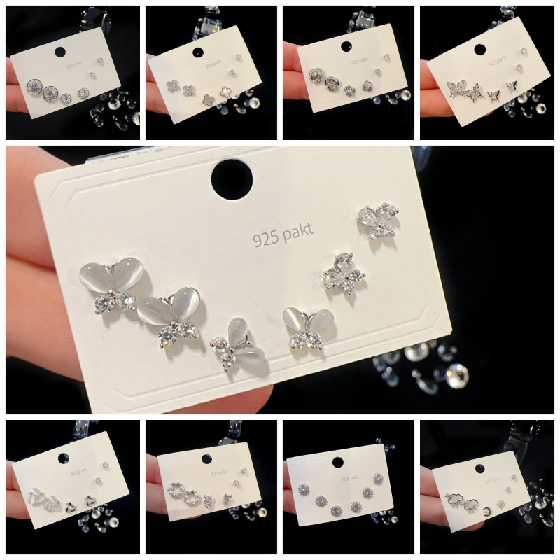 Set de cercei din cupru cu micro-incrustare cu zirconiu, finisaj micropavé; forme variate: personaje, frunză, stea, geometric, animale, litere