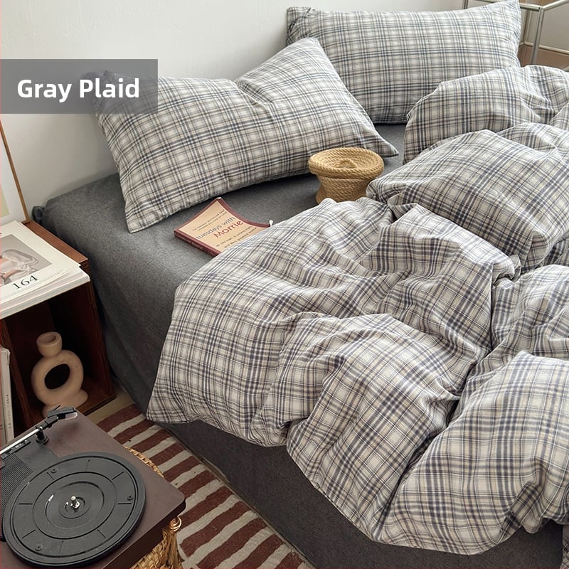 Keturių dalių patalynės komplektas iš 100% medvilnės, siūliniu dažymu, išplautas, languotas raštas