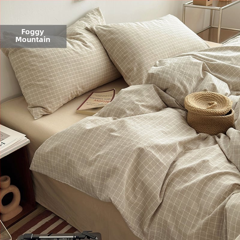 Keturių dalių patalynės komplektas iš 100% medvilnės, siūliniu dažymu, išplautas, languotas raštas