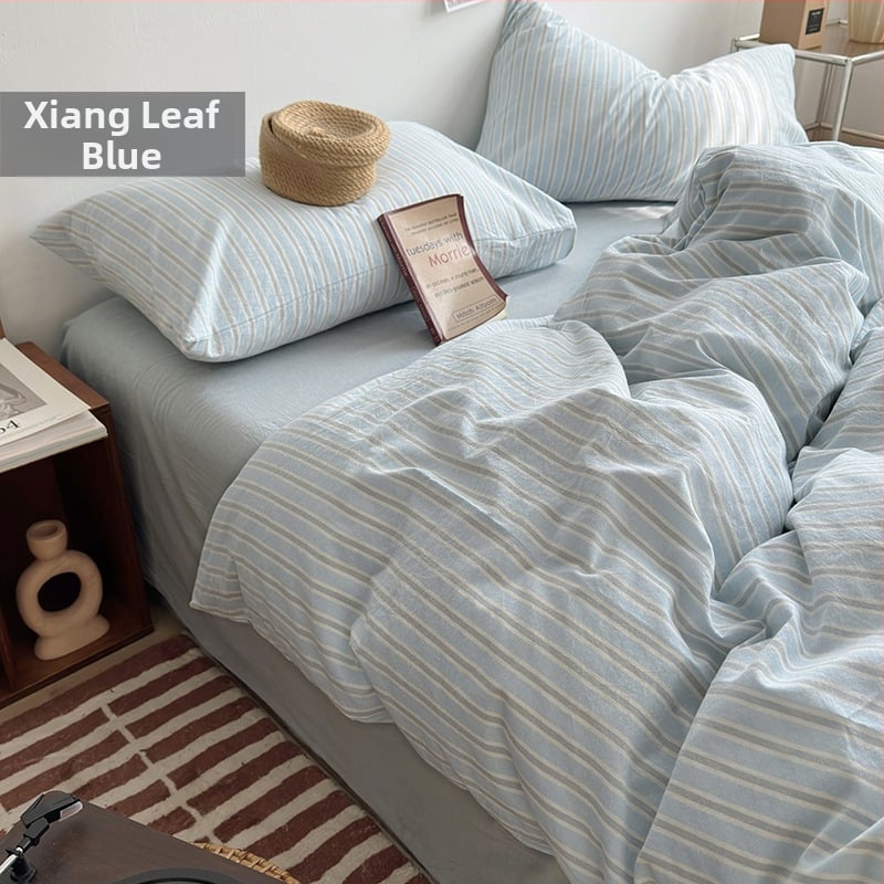 Keturių dalių patalynės komplektas iš 100% medvilnės, siūliniu dažymu, išplautas, languotas raštas