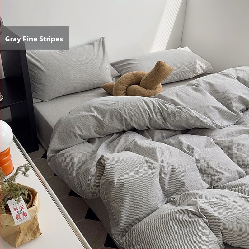 Keturių dalių patalynės komplektas iš 100% medvilnės, siūliniu dažymu, išplautas, languotas raštas