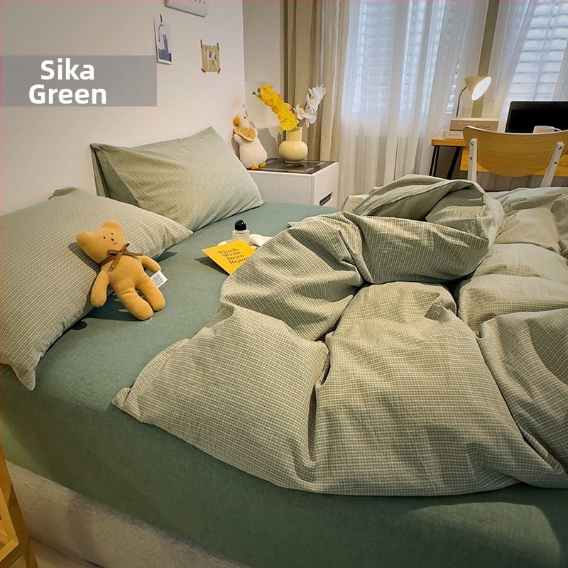 Keturių dalių patalynės komplektas iš 100% medvilnės, siūliniu dažymu, išplautas, languotas raštas