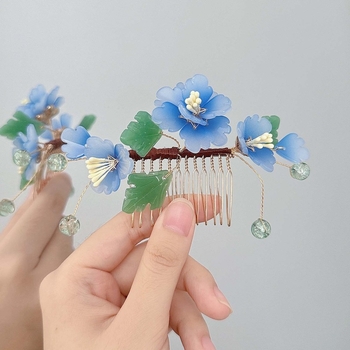 Керамична фиба за коса с етнически стил и мотив цветя, аксесоар за глава, пускана през есента на 2024 година.