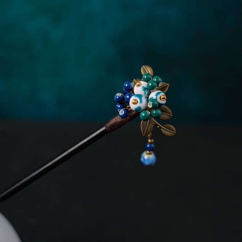 Керамична фиба за коса с етнически стил и мотив цветя, аксесоар за глава, пускана през есента на 2024 година.