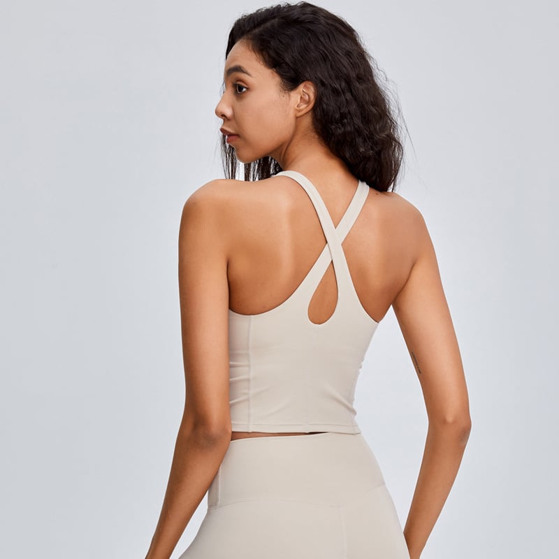  Sutien sport cu bretele late, cupă completă, bretele fixe duble, material lucios din nylon; exterior 80% nylon, căptușeală 95% nylon; cupă model – superioară subțire / inferioară groasă