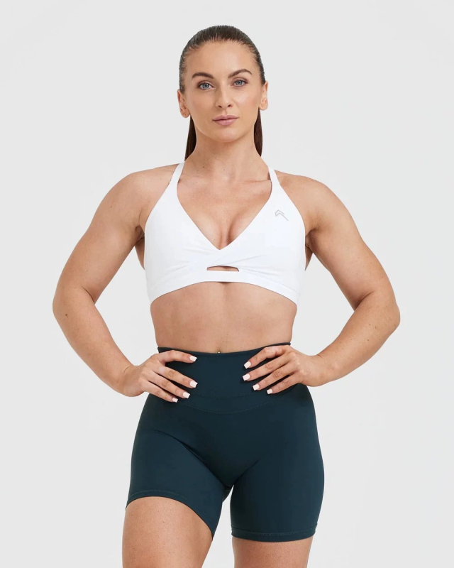 Ženski joga top – vrlo elastičan, brzo se suši, zaštita leđa, duljina do prsa, uski kroj, 75% nylon + 25% spandex, s umetcima za grudi