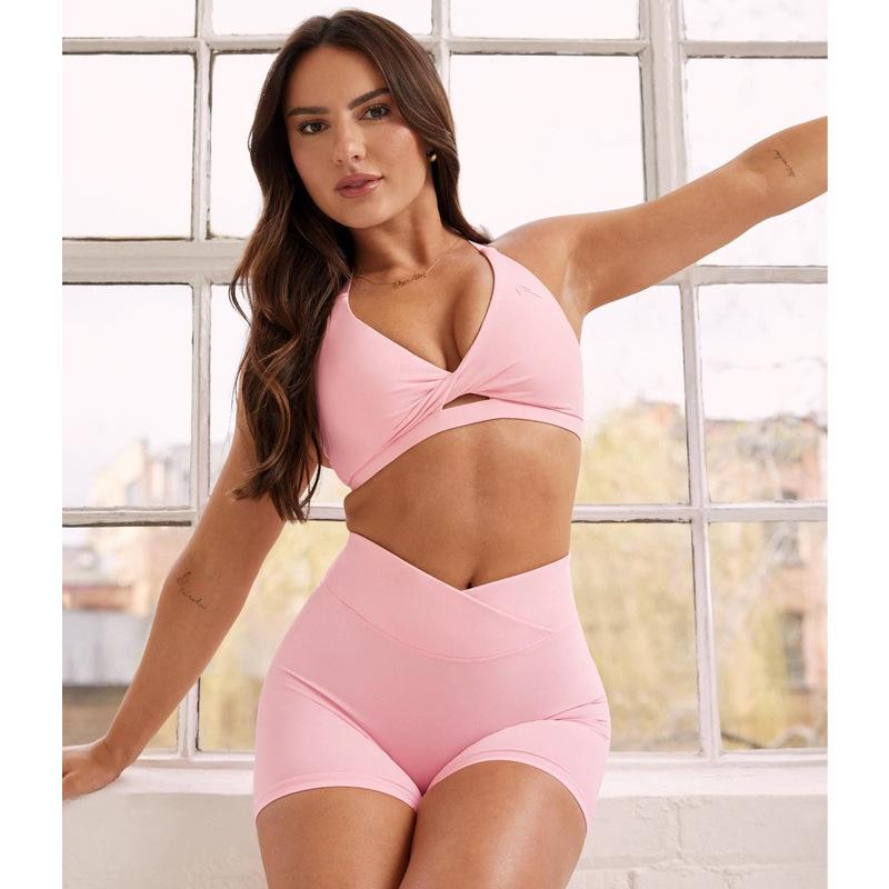 Ženski joga top – vrlo elastičan, brzo se suši, zaštita leđa, duljina do prsa, uski kroj, 75% nylon + 25% spandex, s umetcima za grudi