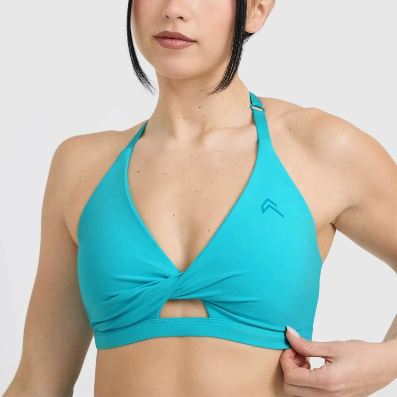 Ženski joga top – vrlo elastičan, brzo se suši, zaštita leđa, duljina do prsa, uski kroj, 75% nylon + 25% spandex, s umetcima za grudi