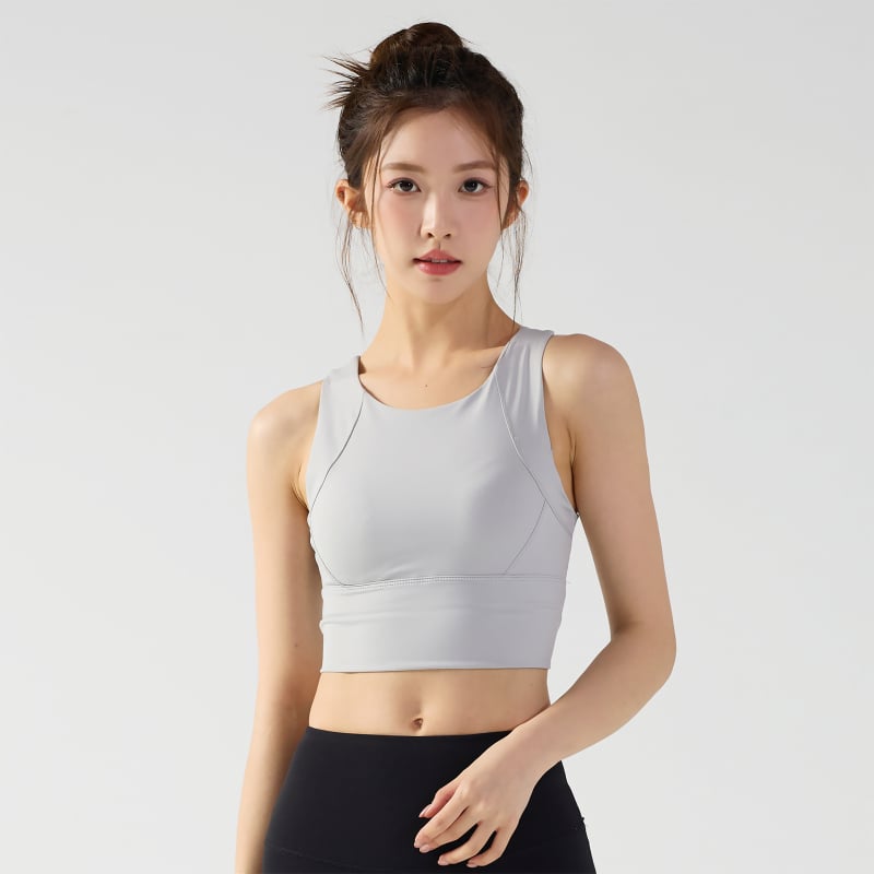 Спортен сутиен с пълни чашки, фиксирани двойни презрамки, дизайн от едно парче, нейлон-спандекс смес, подплата: спандекс