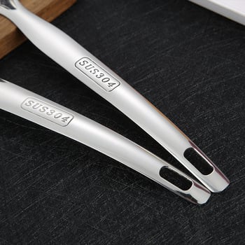 Pikk roostevabast terasest supilusikas integreeritud kurnaga, südamekujuline kujundus, libisemiskindel käepide