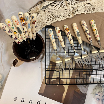 Set žlice i vilice s keramičkom držačem, u stilu Ins, karikatura uzorak, nehrđajući čelik, ogledno poliranje, izlazak 2025