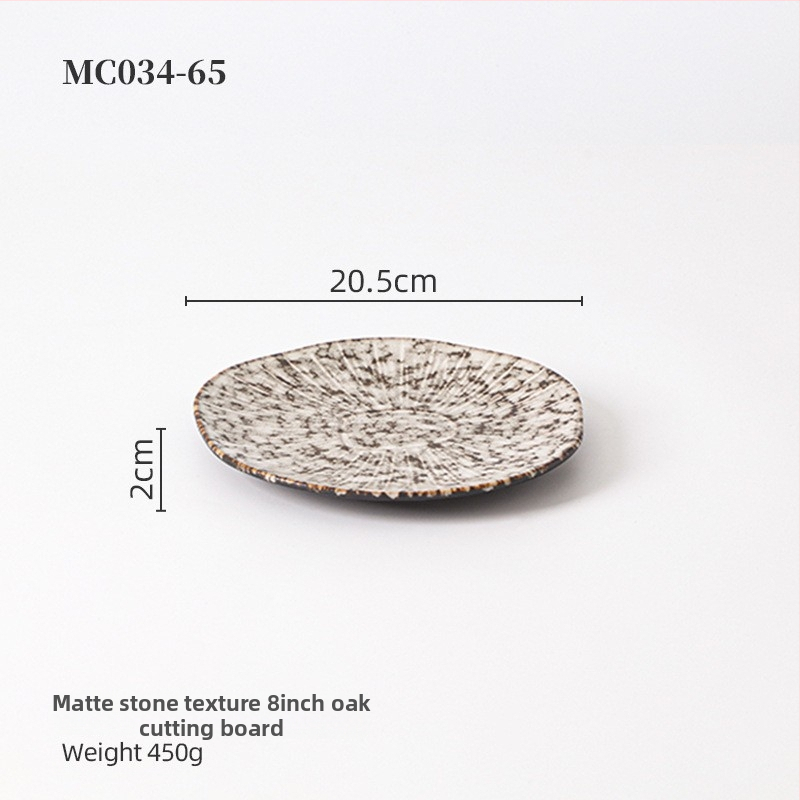 Porcelanski reljefni plitki tanjur, krušnog oblika, s pećnom glazom, pogodan za mikrovalnu