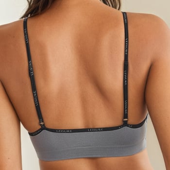 Bezšavnu žensku grudnjicu s košaricom 3/4, bez oblikovanih čašica, otvorena leđa, fiksne dvostruke naramenice, prozračni najlon 90%