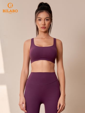 Moterų jogos sportinis liemenėlė su kryžminėmis pečių juostomis, pilnos formos kaušeliai, vidutiniškai formuojami kaušeliai, nailonas 80% / spandeksas 20%