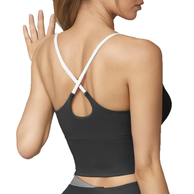 Sportinė liemenėlė treniruotėms: Y formos petys, U formos taurės, be siūlių dizainas, storos formuojančios taurės, nailon-spandekso mišinys (82.5% nailonas, 17.5% spandekso pamušalas).