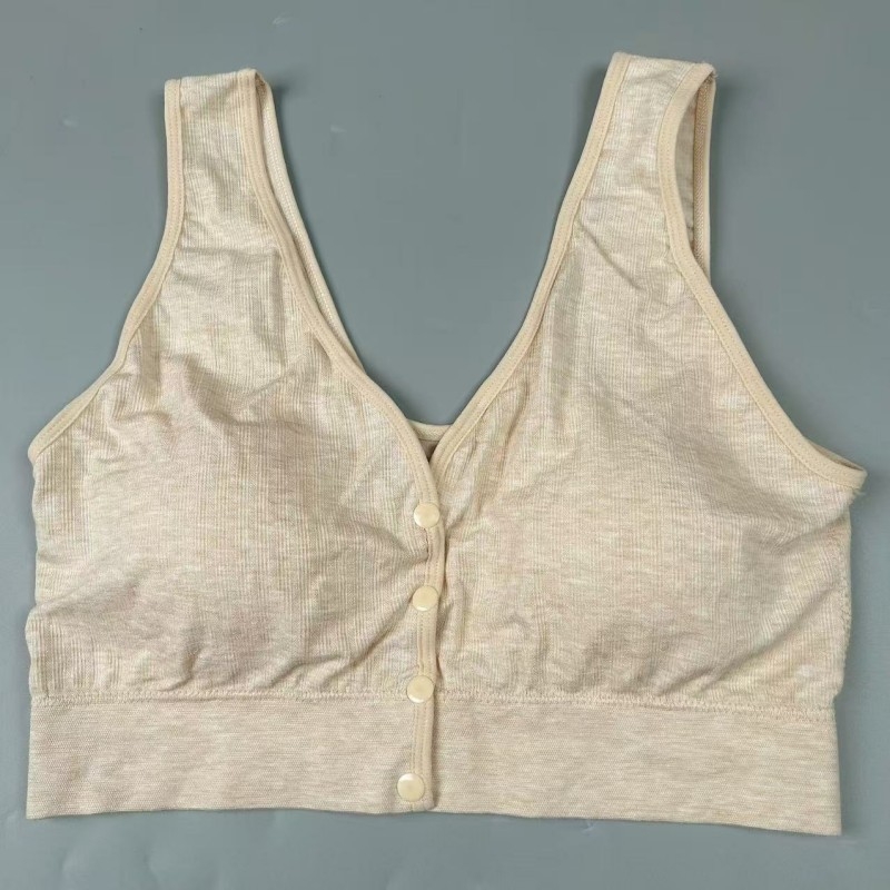 Dojančios liemenėlė be siūlių, priekiniame užsegime sagtys, vest stiliaus, fiksuoti puodeliai, nailono audinys