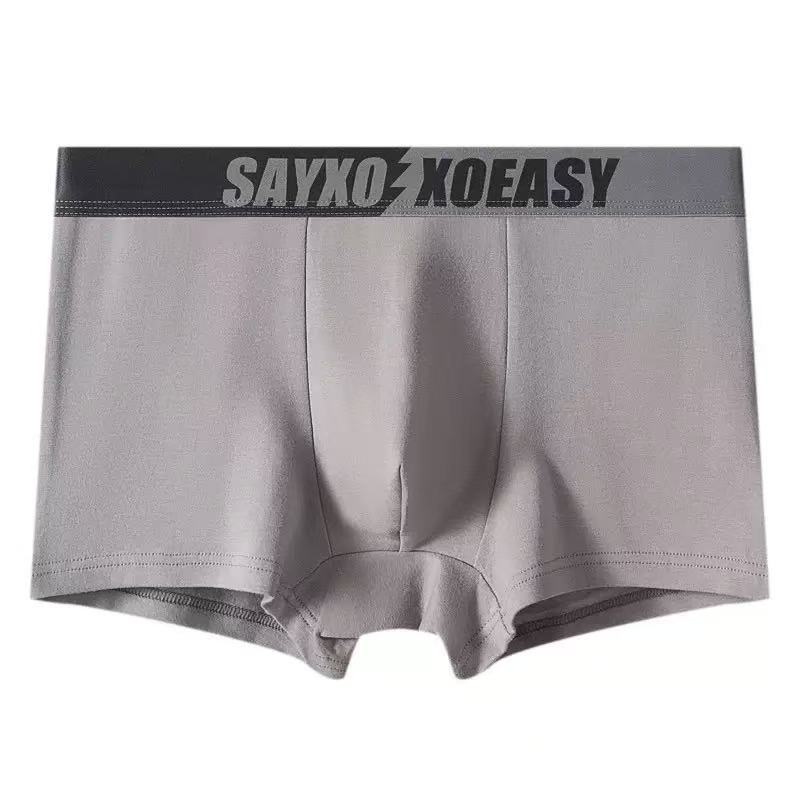 Slips bărbătești din bumbac, confortabile și respirabile, cu căptușeală internă antibacteriană; talie medie; țesătură tricotată; material principal: 95–100% bumbac; căptușeală: 90–95% poliester; modele: uni, blocuri de culoare sau text