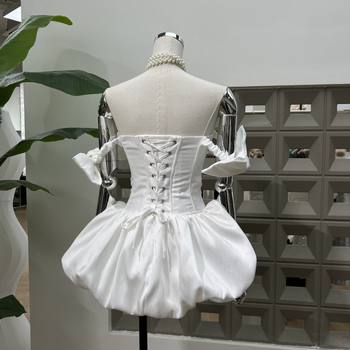 Dviejų dalių poliesterio komplektas: vamzdinis viršus ir trumpa A linijos sijonas