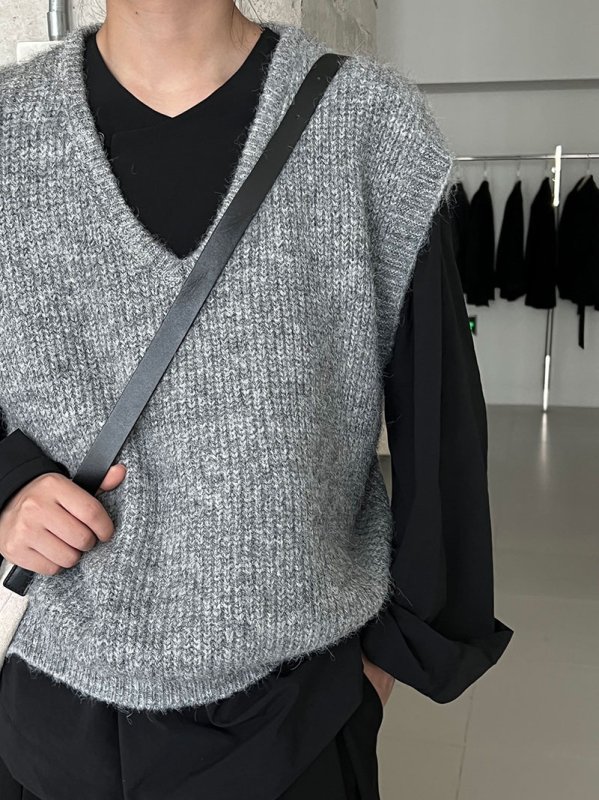 Ženska vunena vestica s V-izrezom, slobodan kroj, japansko-korejski ležerni stil, jesen 2025, mješavina vune i poliestera 30–50%