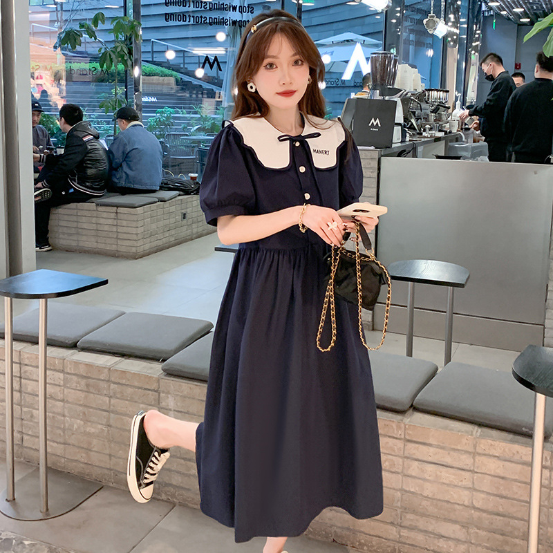 Φορμάκι εγκυμοσύνης για θηλασμό με κουμπιά μπροστά, γιακά τύπου λαπέλ, φούσκωτα μανίκια 3/4, φούστα με πατγουόρκ σε μεσαίο μήκος, ύφασμα πολυεστέρα-βαμβάκι (70–80% βαμβάκι).