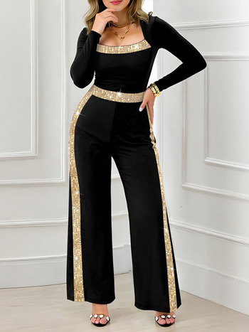 Elegantiškas jumpsuit iš Dzaggene audinio, ilgomis rankovėmis, kvadratinė kaklo linija su siuvinėtomis blizgučių plokštelėmis, reguliuojamas juosmuo, tiesios kelnes