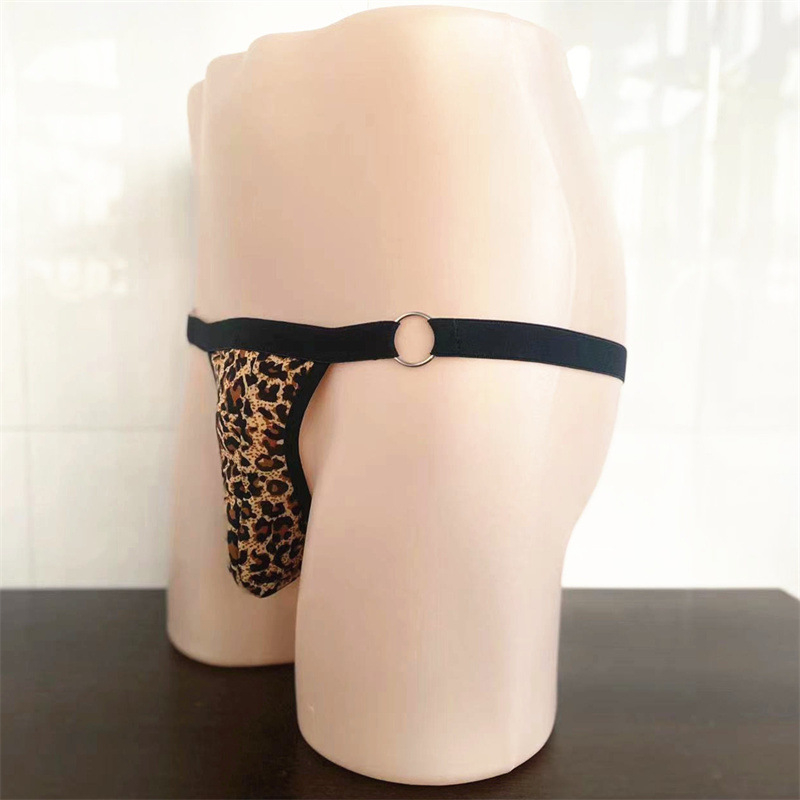 Vyrų thong apatiniai su žemu juosmeniu, kūno formavimo funkcija, dryžių/karo raštas, paprastas pynimas (plain weave), pagrindinio audinio sudėtis mažiau nei 30%, tinka visoms sezonoms.