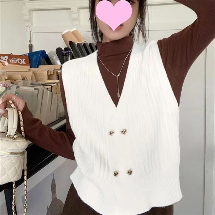 Moteriška megzta be rankovių liemenė su V formos kaklu, dvigubo užsegimo plokštelė, 3D raštas, akrilo-poliesterio mišinys