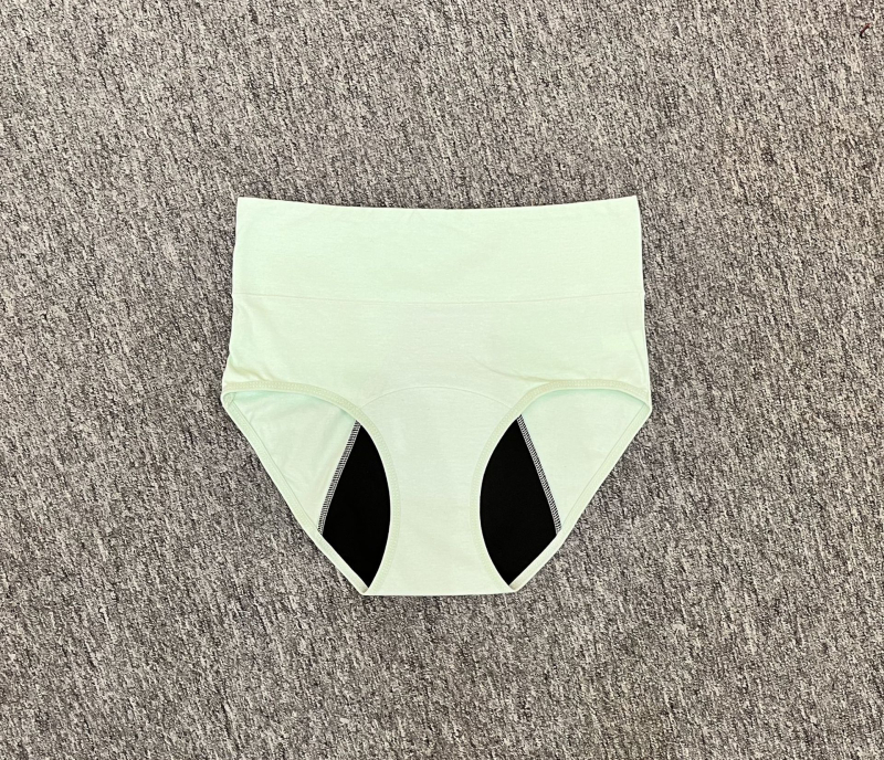 Menstruacijoms skirtos apatiniai su aukštu liemeniu, vientisos spalvos; pagrindinė medžiaga: medvilnės mišinys 95% medvilnė; tarpvagialinė danga 95% medvilnė