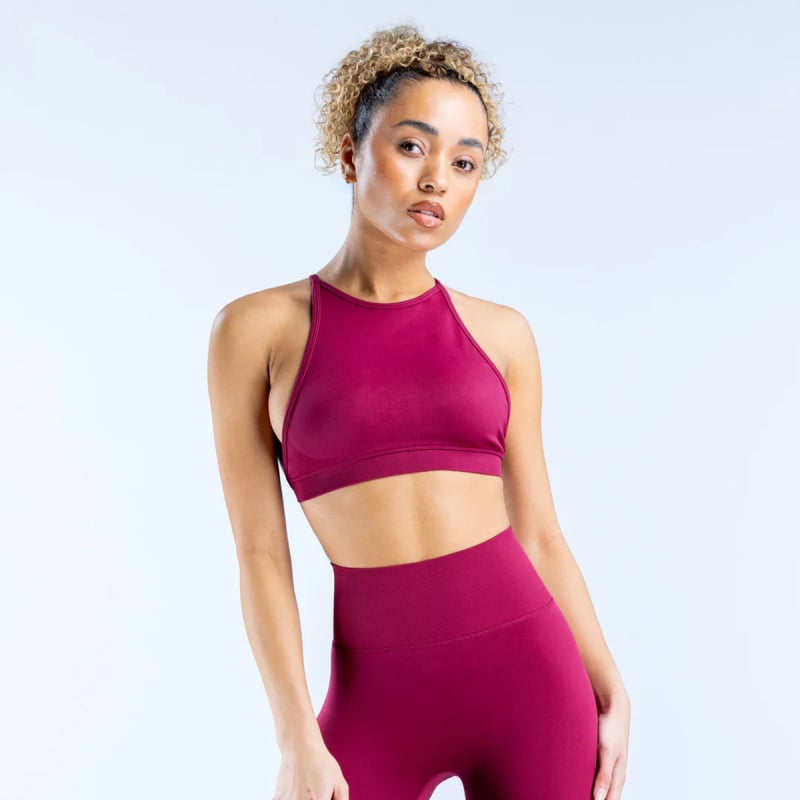 Sieviešu haltera kakla sporta krūšturis ar noņemamām krūšu spilventiņiem, šaurs siluets, sastāvs 90% neilons / 10% elastāns, īss garums līdz vēderam