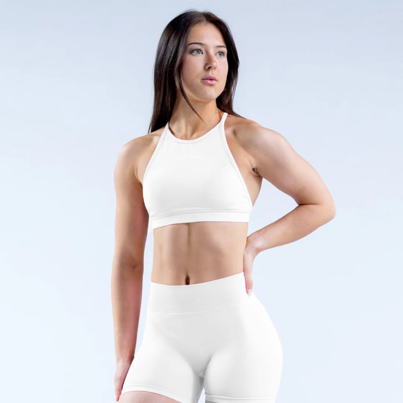 Sieviešu haltera kakla sporta krūšturis ar noņemamām krūšu spilventiņiem, šaurs siluets, sastāvs 90% neilons / 10% elastāns, īss garums līdz vēderam