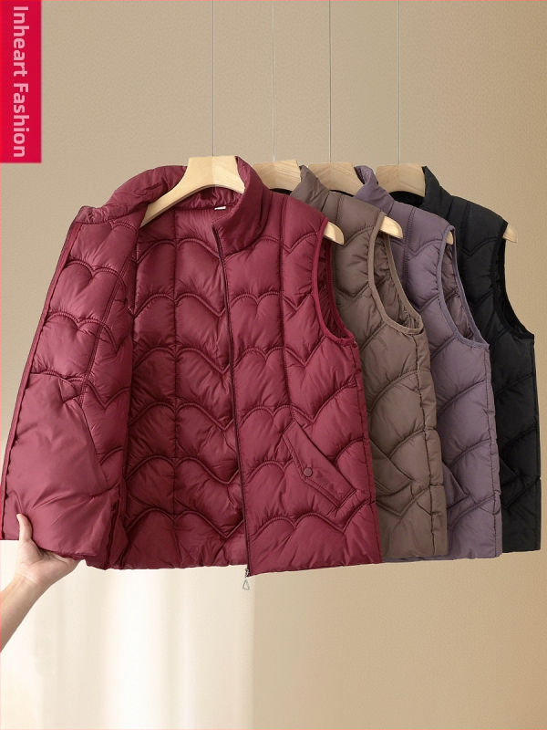 Ženská zimná vesta s izoláciou z pu-pamä, hlavný materiál polyester (>95%), dĺžka 50–65 cm, bez goliera, bez žehlenia, ležérny elegantný štýl