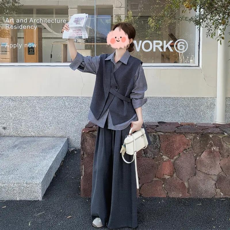 Costum trei piese în design coreean: vest asimetric, cămașă cu dungi și pantaloni largi evazați (Primăvara 2025)