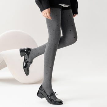 Velúr harisnyanadrág hullám‑pöttyös mintával, közepes vastagság, egyoldali ágyéktáji kivitel, viszkóz 70–80%