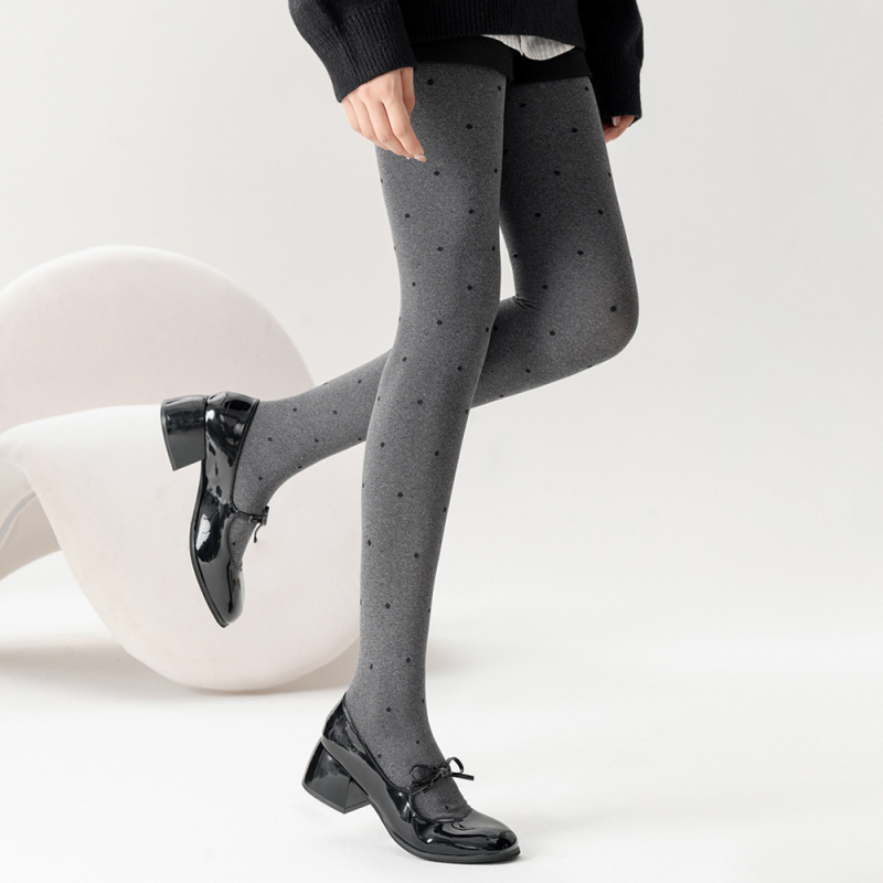 Velúr harisnyanadrág hullám‑pöttyös mintával, közepes vastagság, egyoldali ágyéktáji kivitel, viszkóz 70–80%