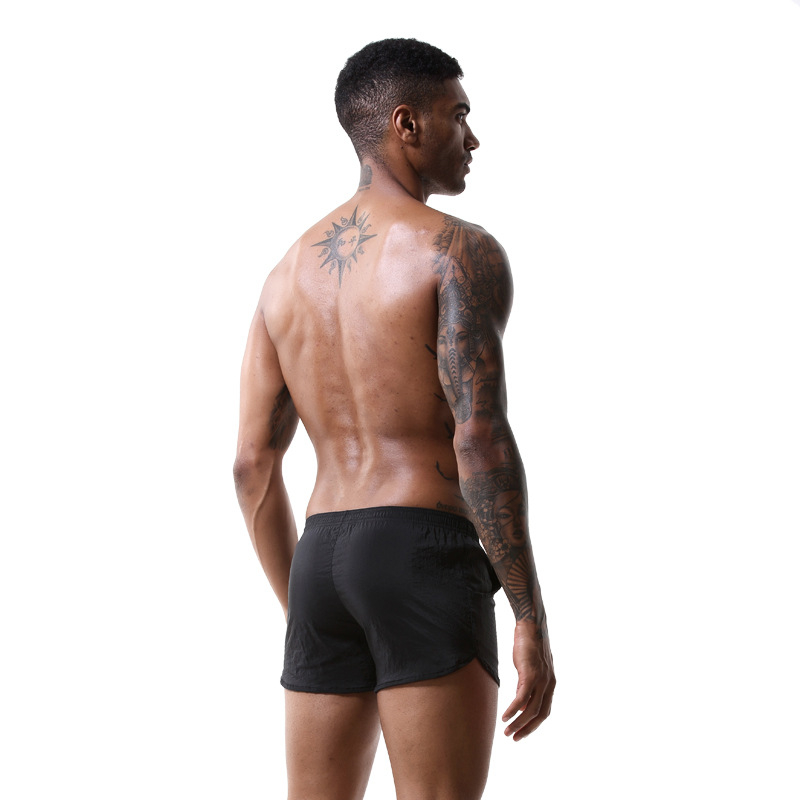 Muške hlače od tkanog materijala s džepovima, prozračne, opuštenog ravnog kroja, niski struk