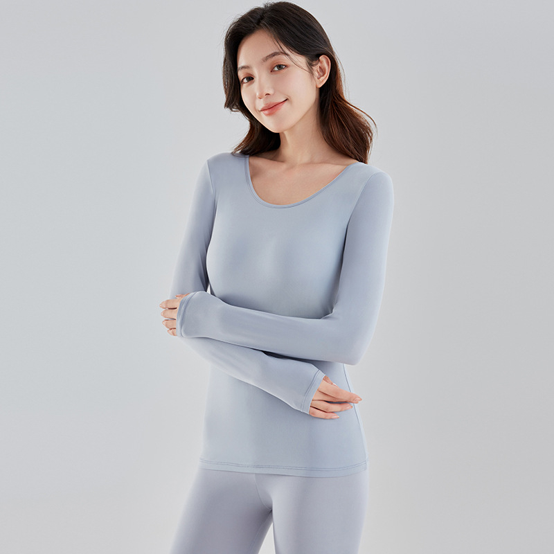 Ženski termalni pleteni set: tanak materijal; 90% katijonički poliester + 10% elastan podstava; 160 g/m2; okrugli izrez; pulover + široke hlače; toplo i udobno.