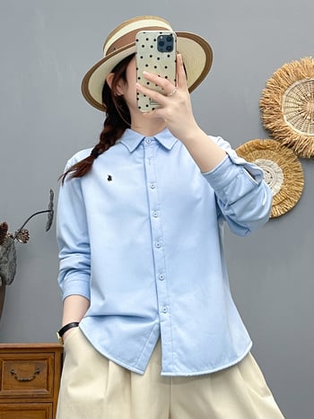 Pamukasta kardigan-košulja, duge rukave, ovratnik s reverom, jednostruko kopčanje, duljina 50–65 cm