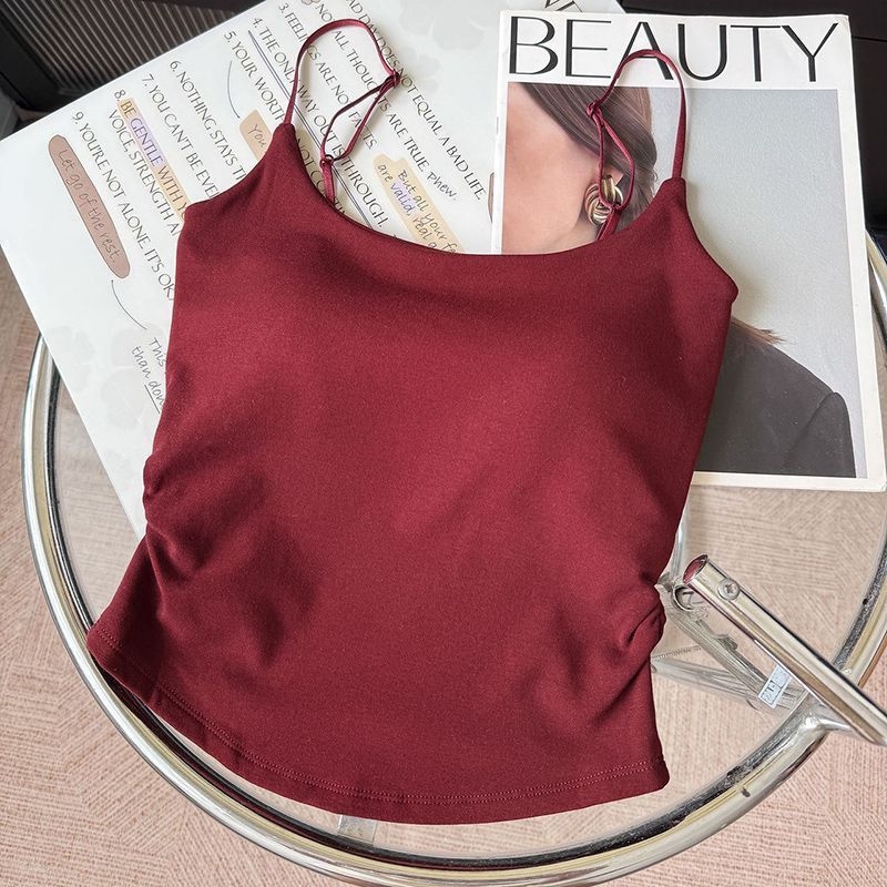 Terminė liemenė su įmontuotais krūtinės pagalvėlėmis, viskozė, gobtuvas, keturkampis kaklo iškirpimas, velveto pojūtis