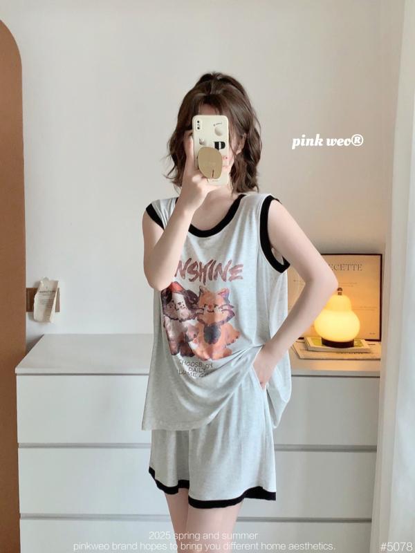 Set de pijamale din modal cu imprimeu cartoon pisică și câine, cu pernă pentru sân — top fără mâneci și șort, guler rotund