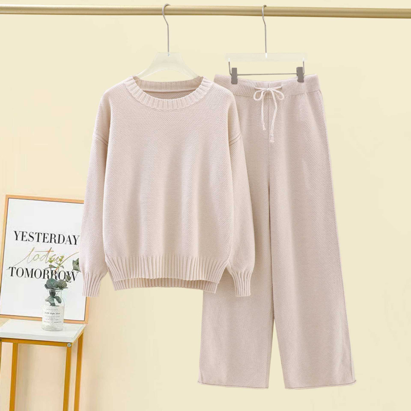 Ženski pleteni casual dvodijelni set s udobnim puloverom i широким hlačama.