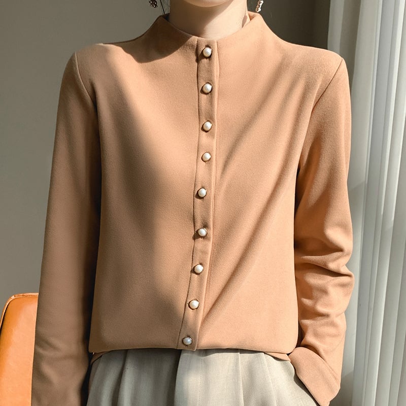 Kreklis kardigāns no ķīmisko šķiedru maisījuma ar poliesteru, vienkrāsains, stāvošā apkakle, garas piedurknes, pūderēta virsma, pērlīšu pogas, izsmalcināts ikdienas stils, garums 50–65 cm