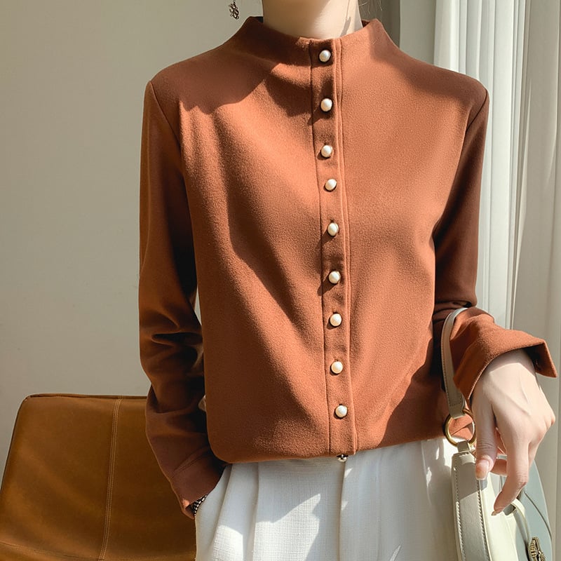 Kreklis kardigāns no ķīmisko šķiedru maisījuma ar poliesteru, vienkrāsains, stāvošā apkakle, garas piedurknes, pūderēta virsma, pērlīšu pogas, izsmalcināts ikdienas stils, garums 50–65 cm